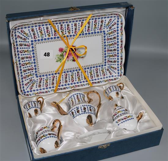 A cased miniature coffee set for two